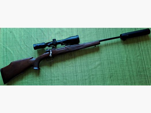Rifle repetidora Sistema Mauser 98 en 30-06 con Zeiss Conquest V4 3-12x56 y silenciador Atec H2