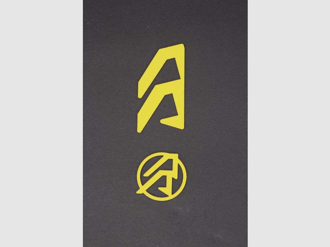 Inserto con logotipo para funda Alpha-X, amarillo, izquierdo (102470)., imagen 1 de 3