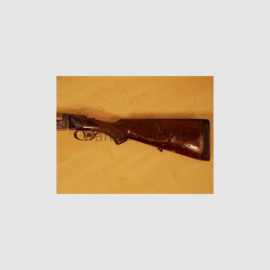 Forest double-barreled shotgun colored and engraved