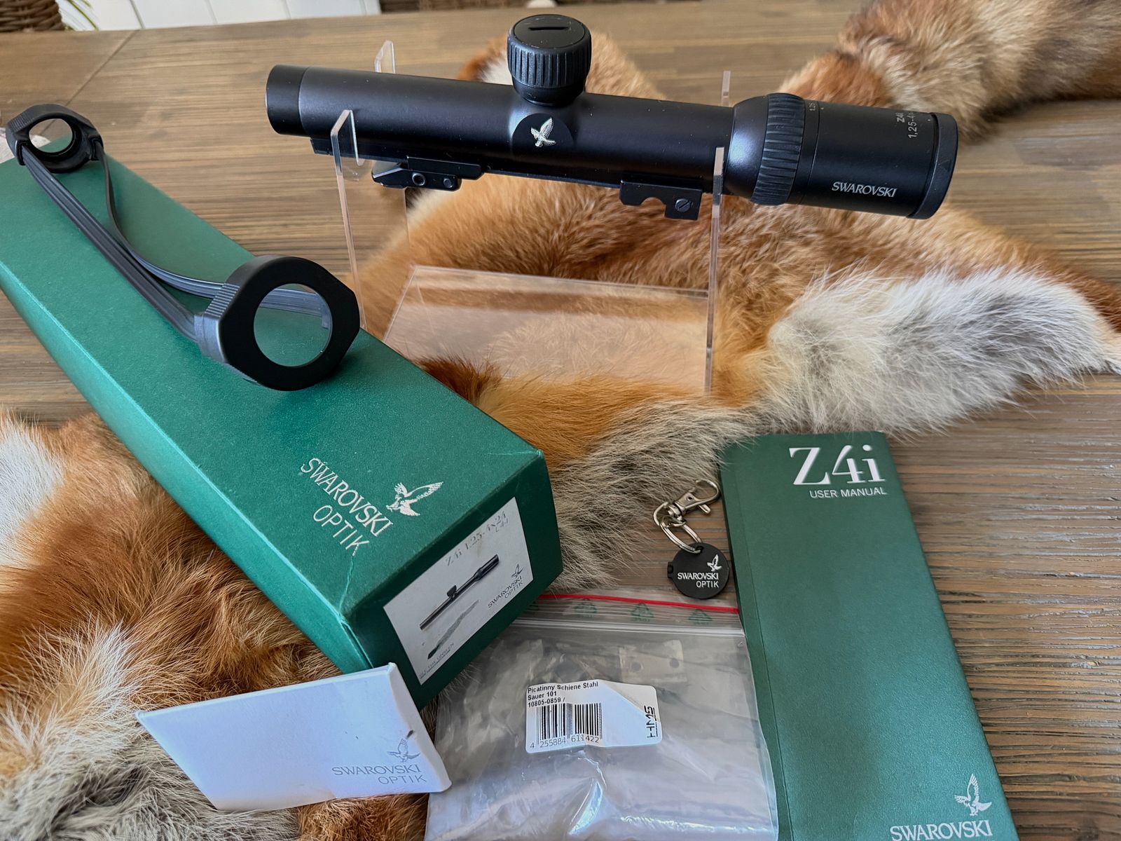 Swarovski Z4i 1.25-4x24 z szyną i montażem obrotowym EAW, zdjęcie 1 z 9