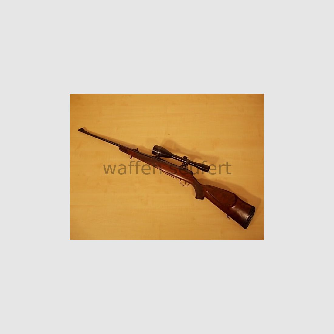 Sauer 80 con Kahles 8x56A4 y SWM