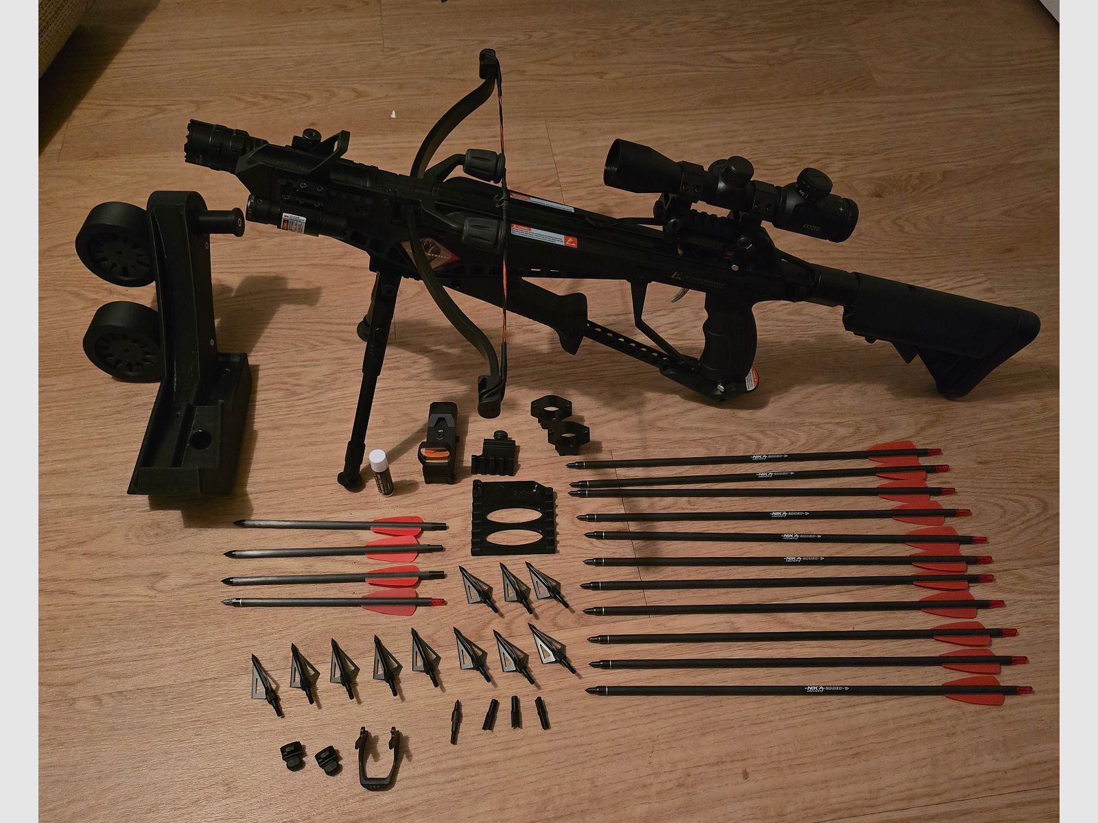 An Archery Cobra RX130 Sniper Crossbow with a lot of accessories