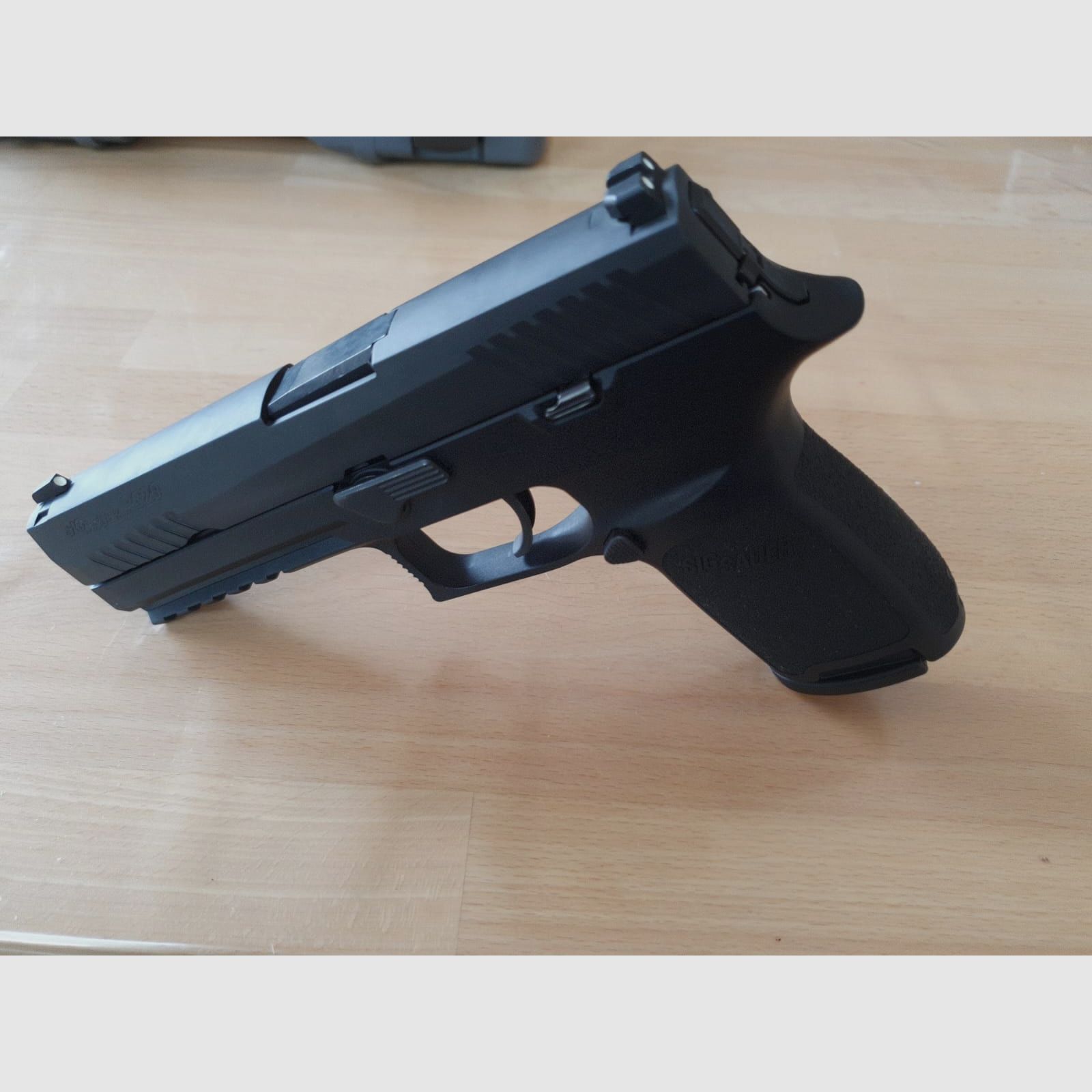 Sig Sauer P320 9mm Fullsize with case well-maintained condition