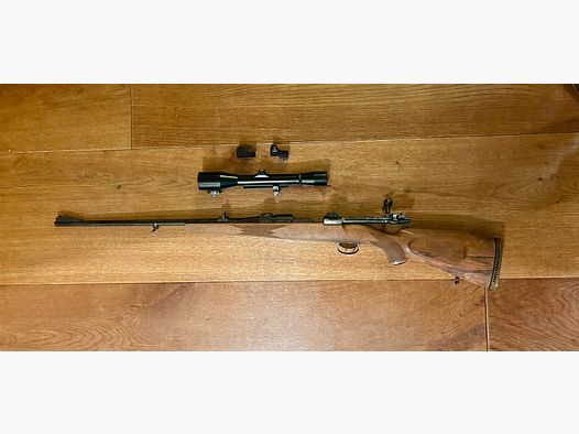 Mauser 98 caliber 7x64 with S&B 6x42 scope and Doctor red dot sight