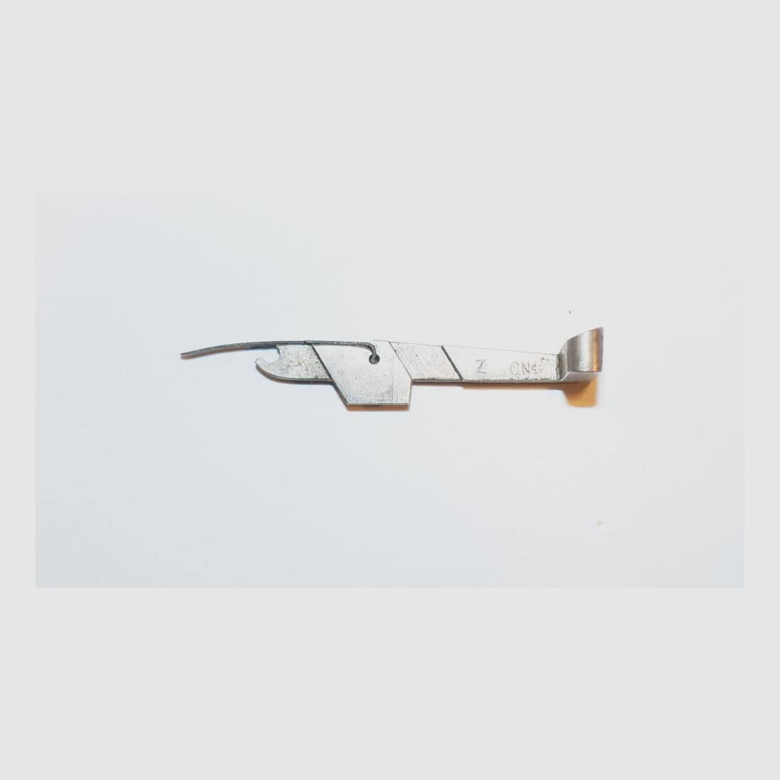 Waffenfabrik Bern Gebr. Verschlußfanggelenk mit Feder f. Schweizer Ordonnanzpistole Parabellum 1906 Kal.7,65mmPara P08