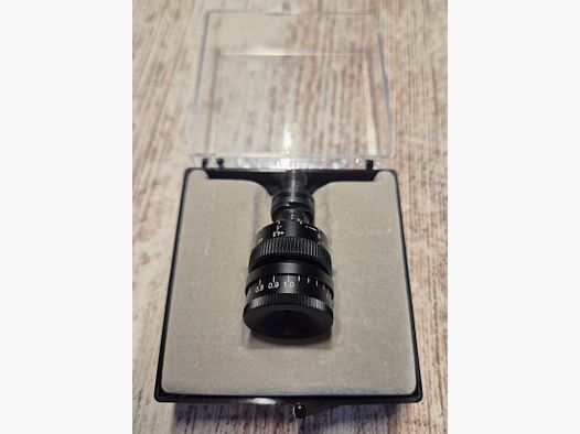 Gehmann iris diaphragm with optics