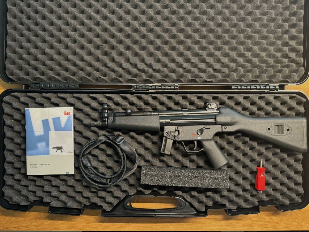 Heckler and Koch SP5 rifle with B&T RBS silencer SQD™ Compact