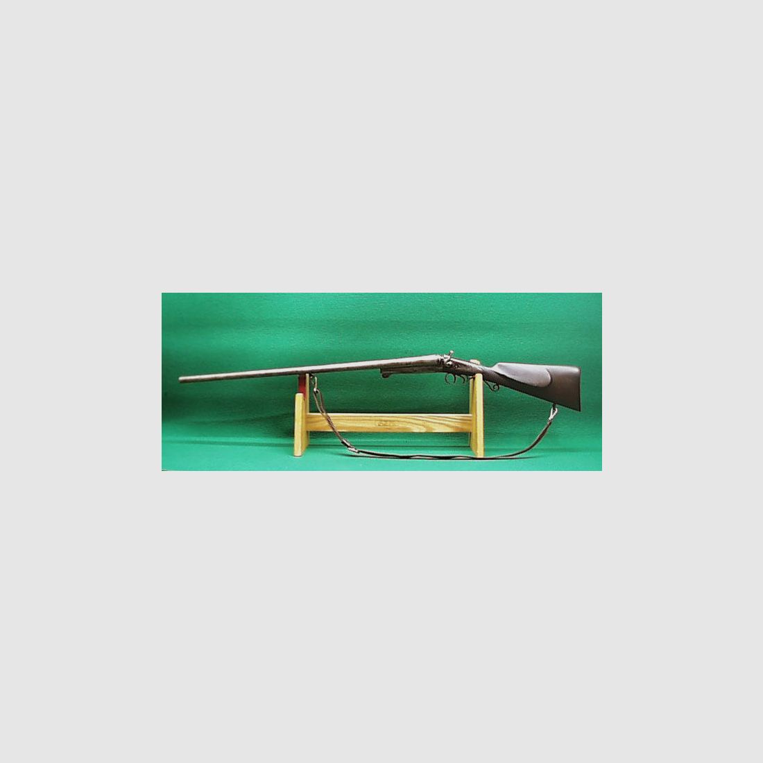 Double-barrel shotgun with spoon lock