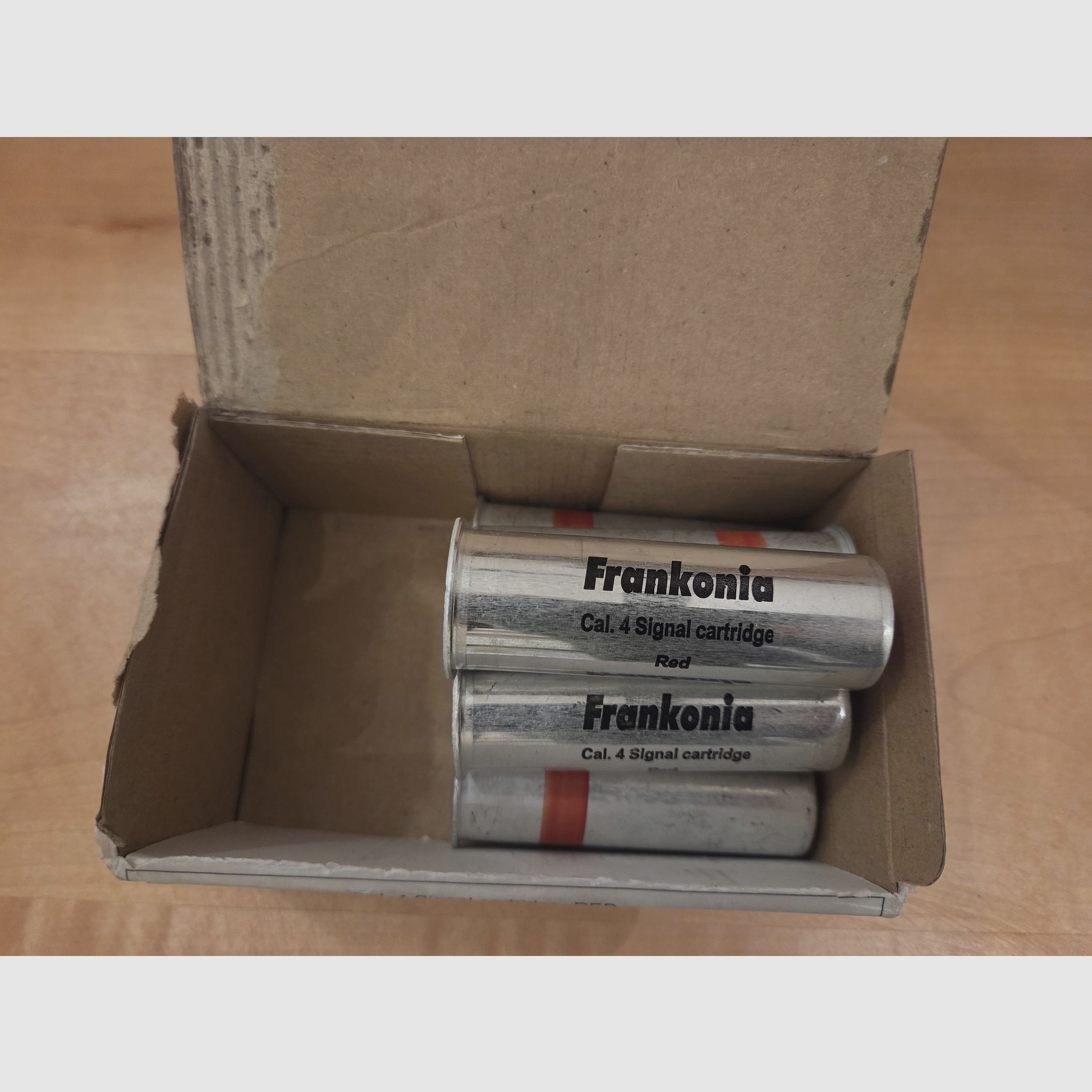 Flare gun with red signal ammunition