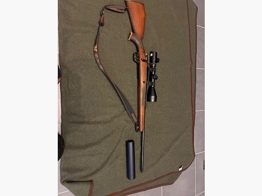 Voere repeater 7x64 with silencer and scope