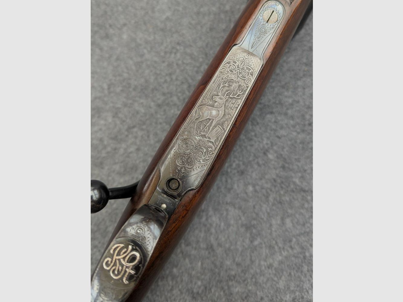 Mauser Mod 98 with animal engraving and stalking safety