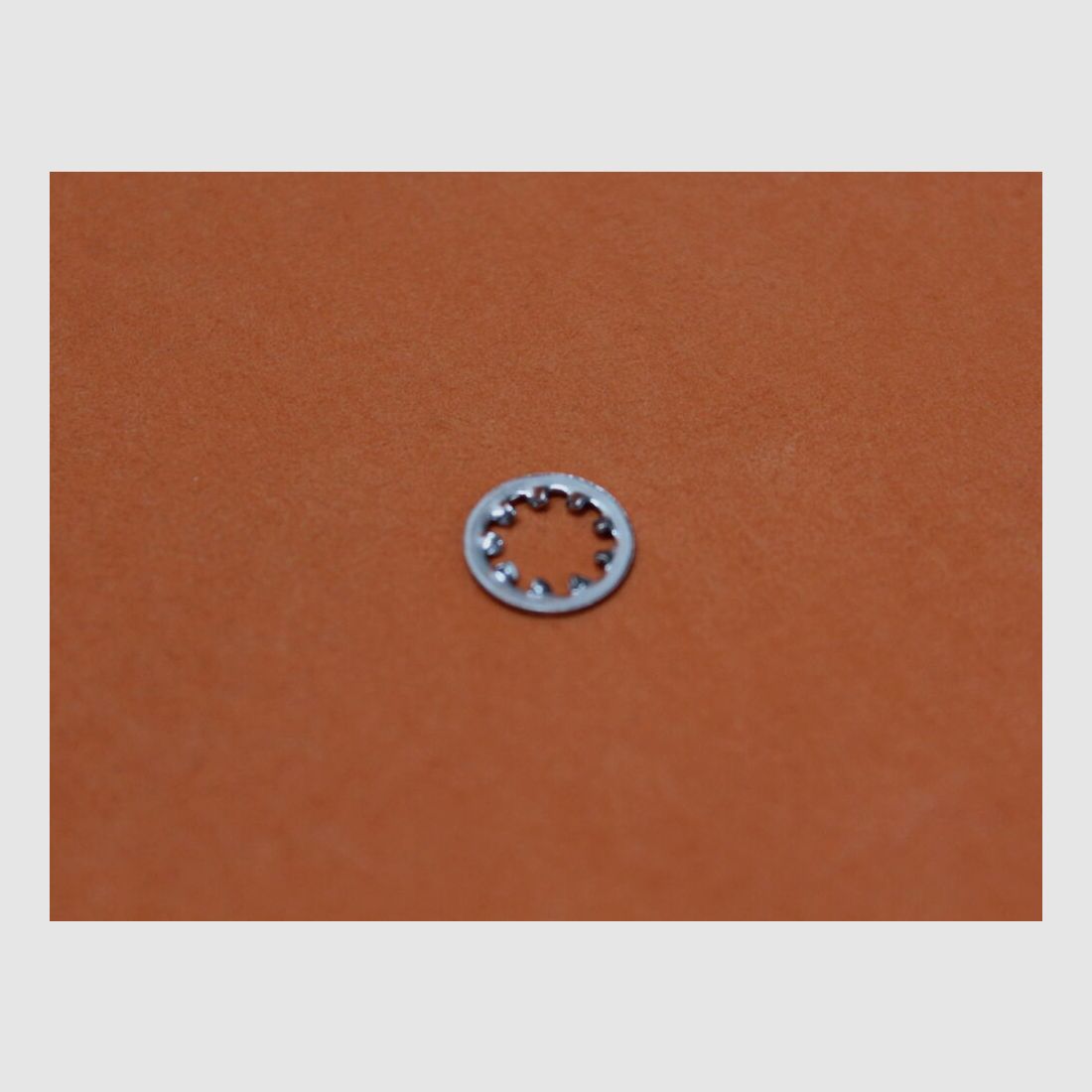 Olympic AR-15: Pistol Grip Screw Lock Washer Olympic #AR73 Ring voor Pistolengriff-schroef, afbeelding 1 van 2