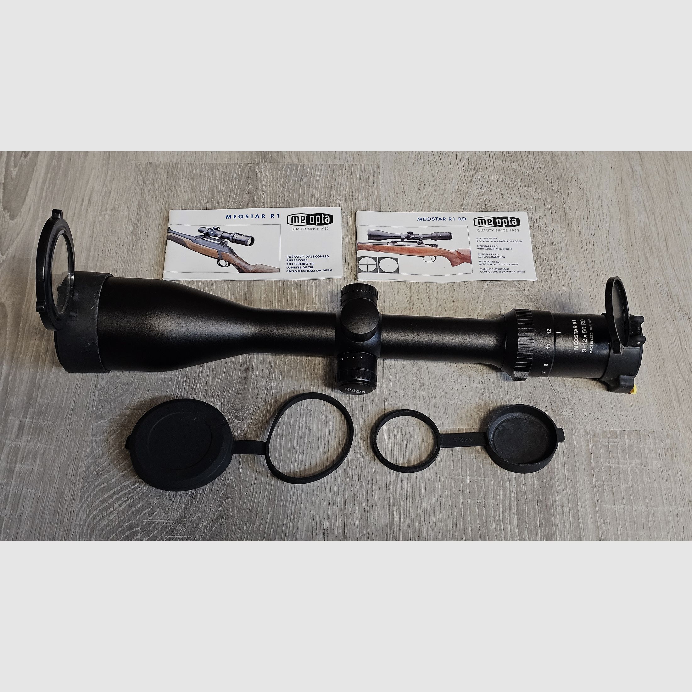 Viseur Meopta MeoStar R1 3-12x56 RD (point lumineux, Abs. 4C) incluant le montage Blaser original (anneaux de 30 mm) et des capuchons Flip-Open