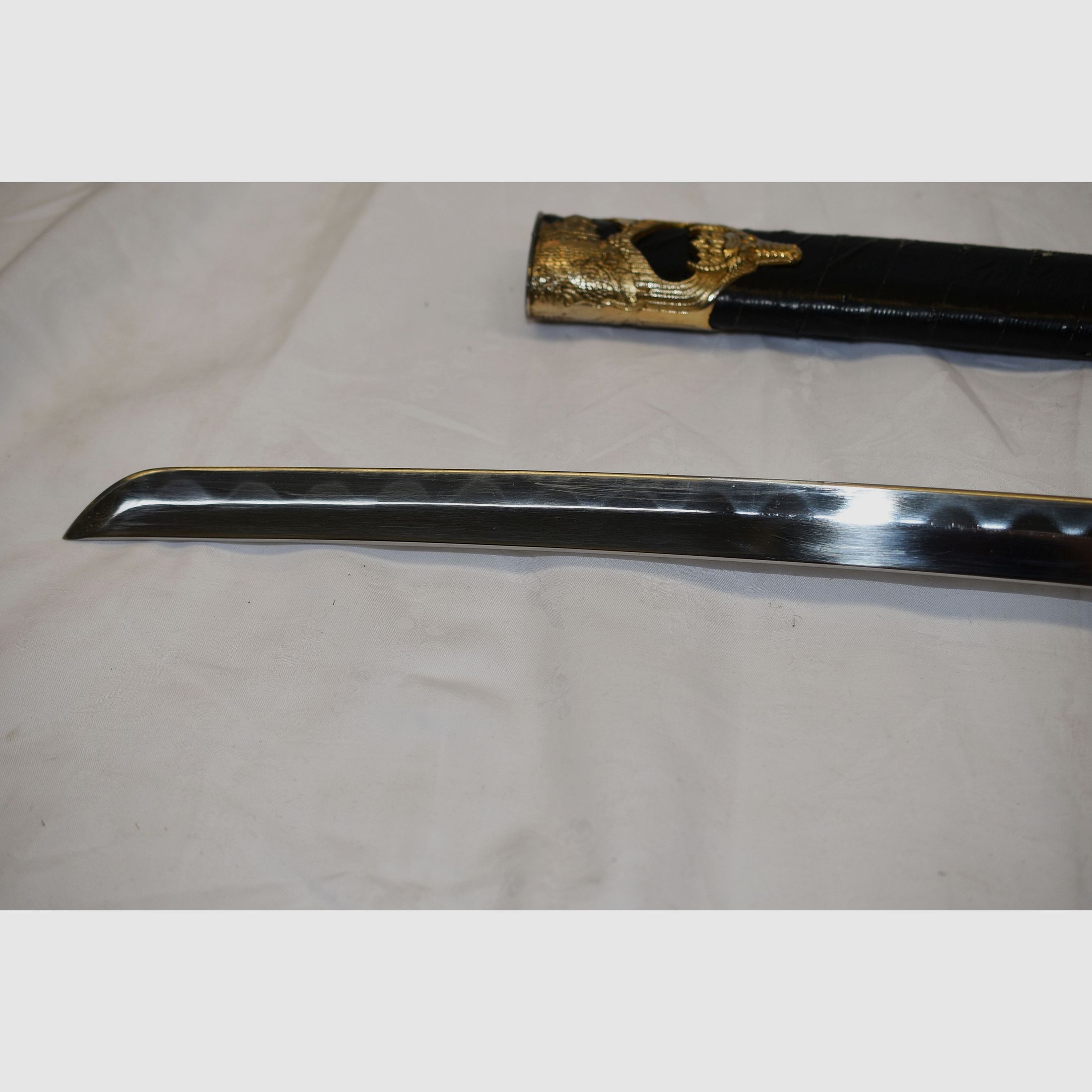 Japans zwaard, Samurai, Katana, Wakizashi, met Menuki op de greep