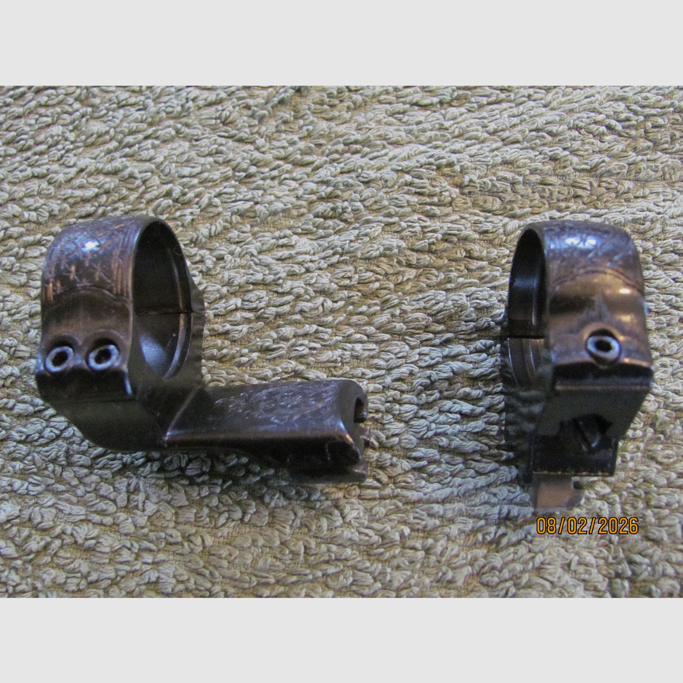 Montaggio a gancio anelli 25mm neri anodizzati e decorati