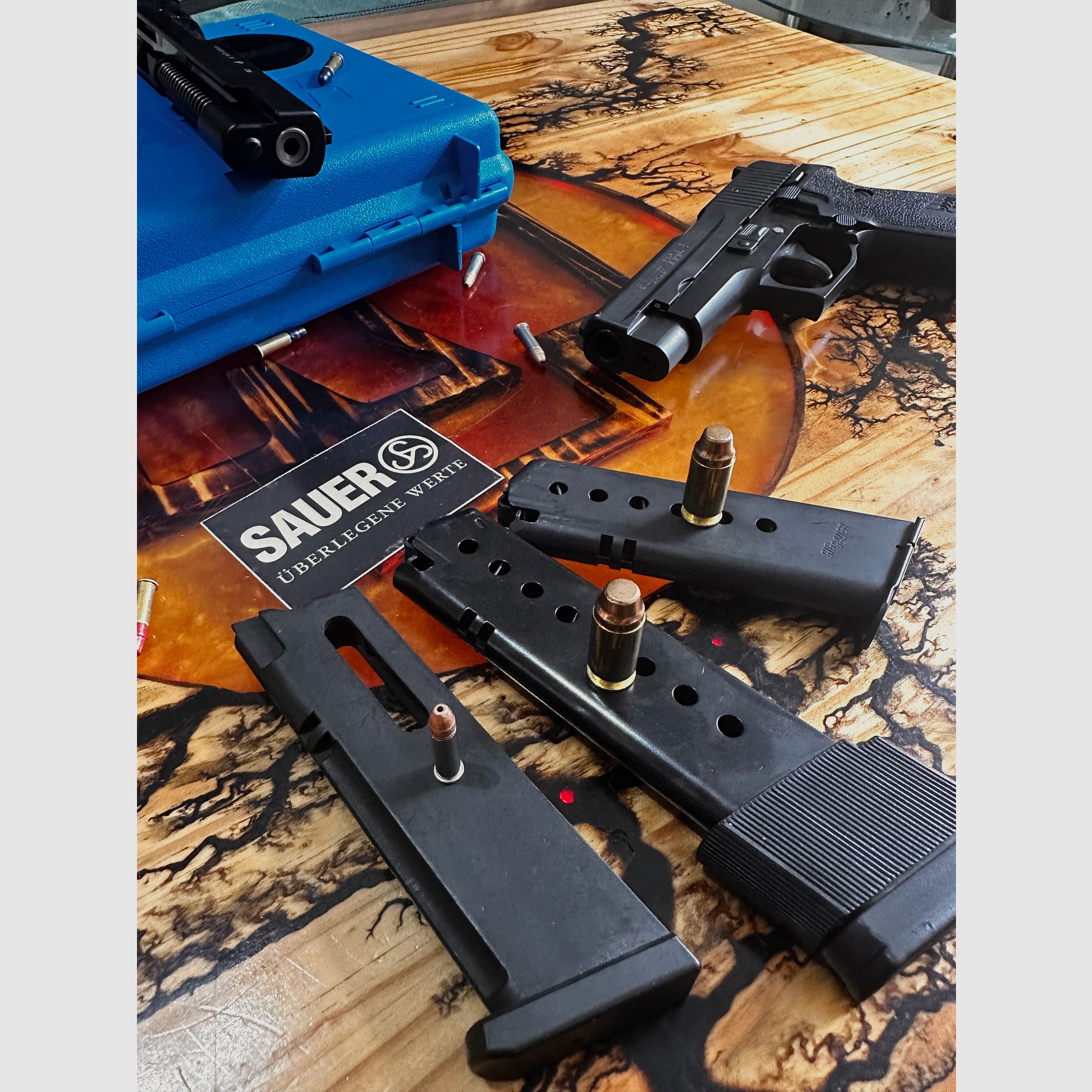 Sig Sauer P220, caliber 45 ACP including interchangeable system 22 lfb