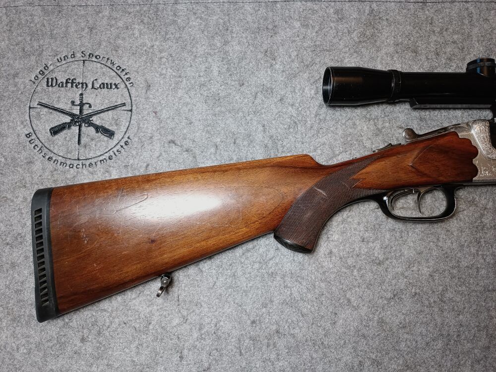 Escopeta de doble cañón Meuter Solingen similar al modelo Heym 55 con mira 6x42