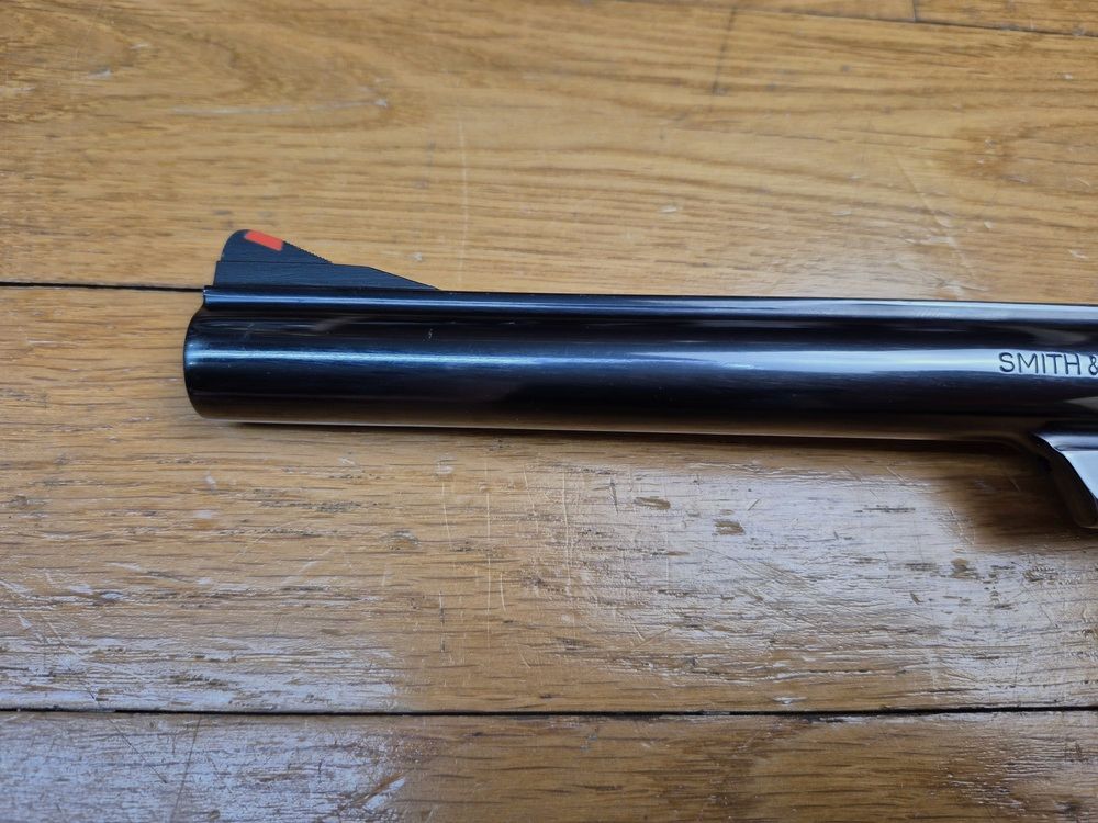 Terror of bears! – Smith & Wesson M29-2 Revolver – Cal .44Mag – Barrel 8&prime; 3/8 inches – The longest in the catalog! – Exceptional blued finish – Gun from 1980 – Stunning mechanics and unavailable today – Cinematic myth as much as a firearm! TBE++!, image 7 of 27