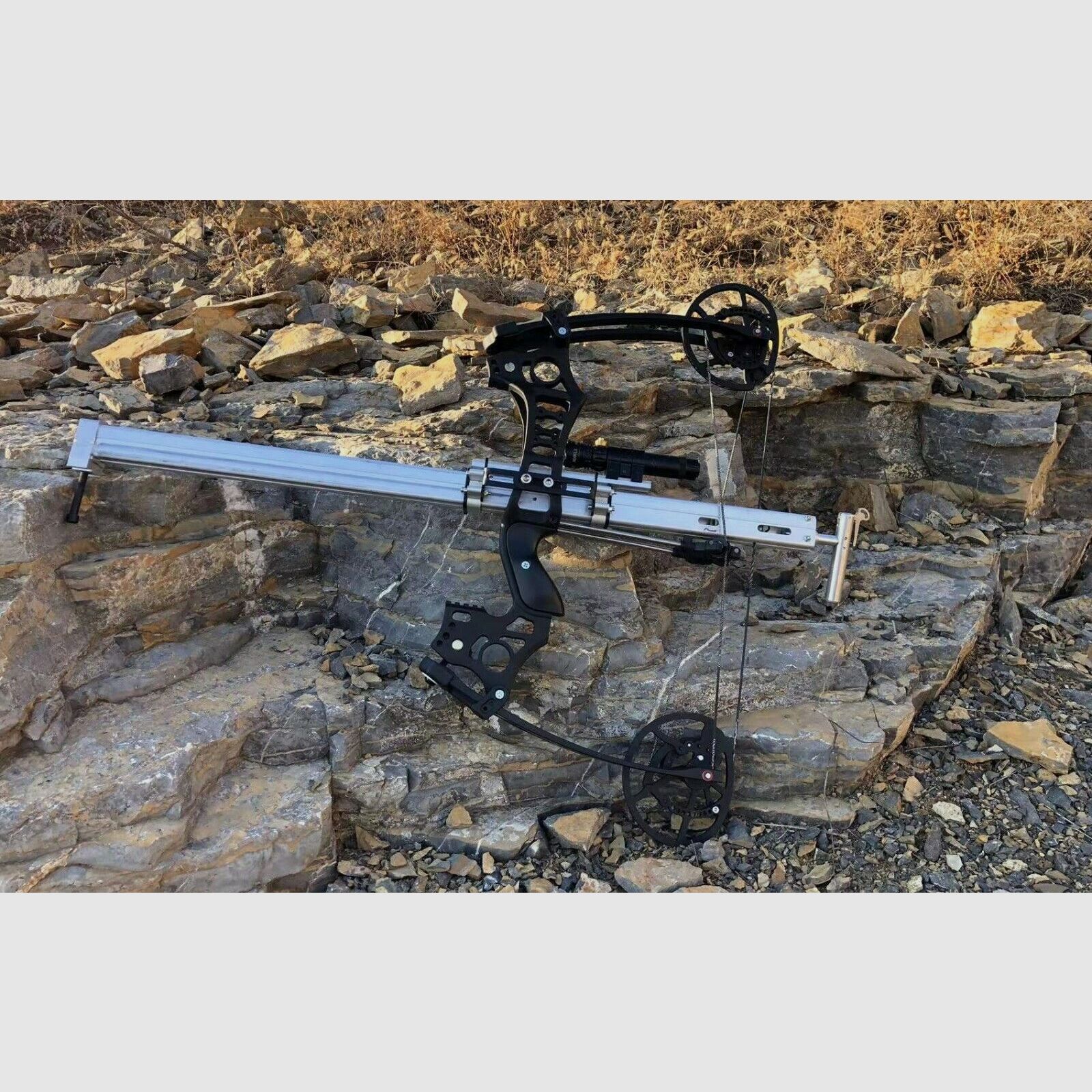 Shotgun compound bow - firing a shot of pellets using a bow