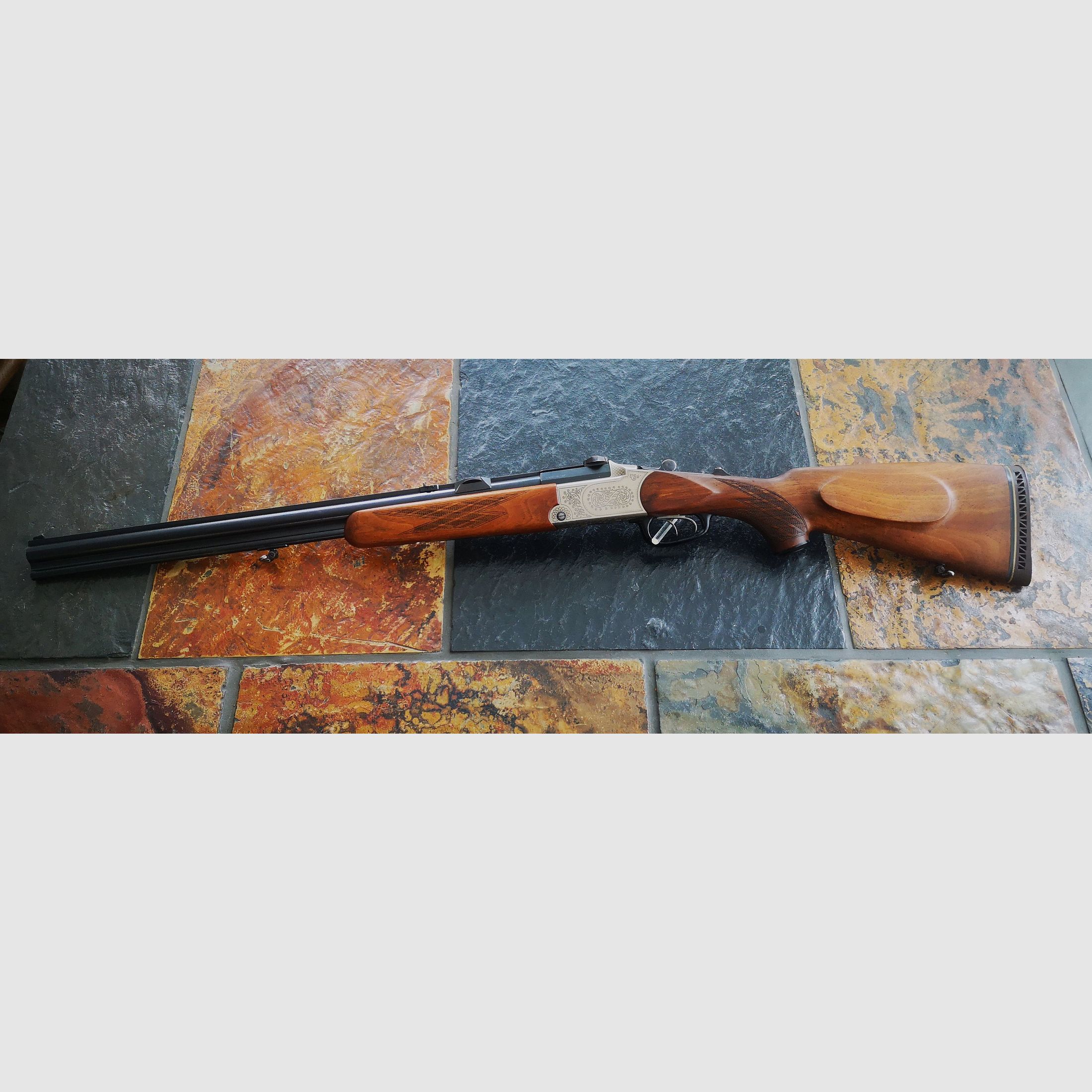Blaser BBF 5.6x50 R Magnum 16/70 with manual cocking, over-and-under combination gun.
