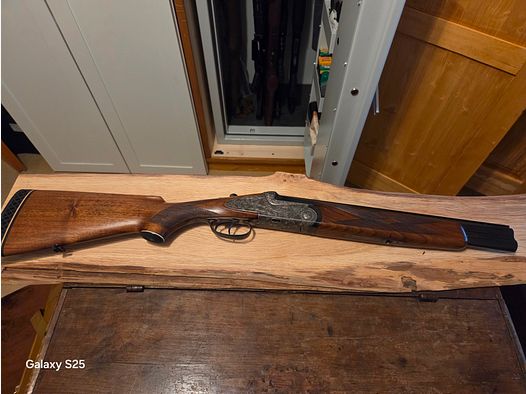 Trade: sawed-off shotgun (new proof) for March scope