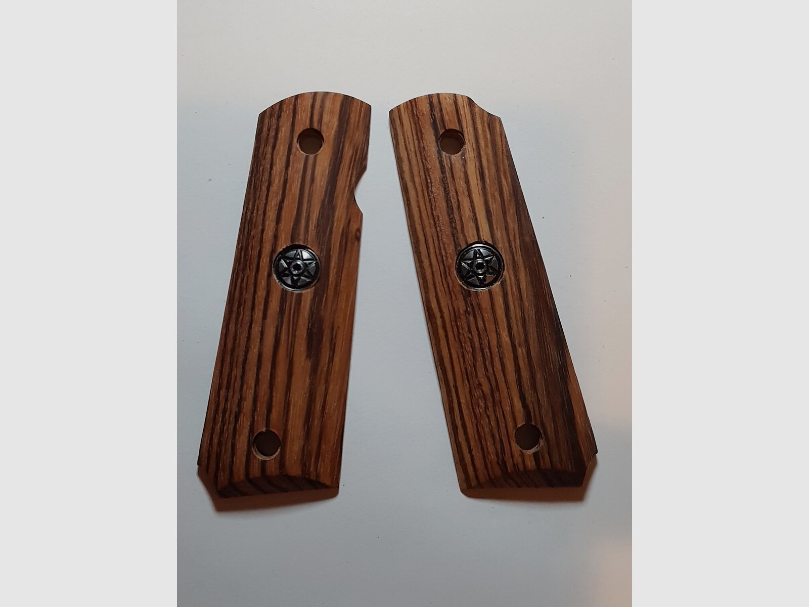 Grips of the Colt 1911 P.A.K