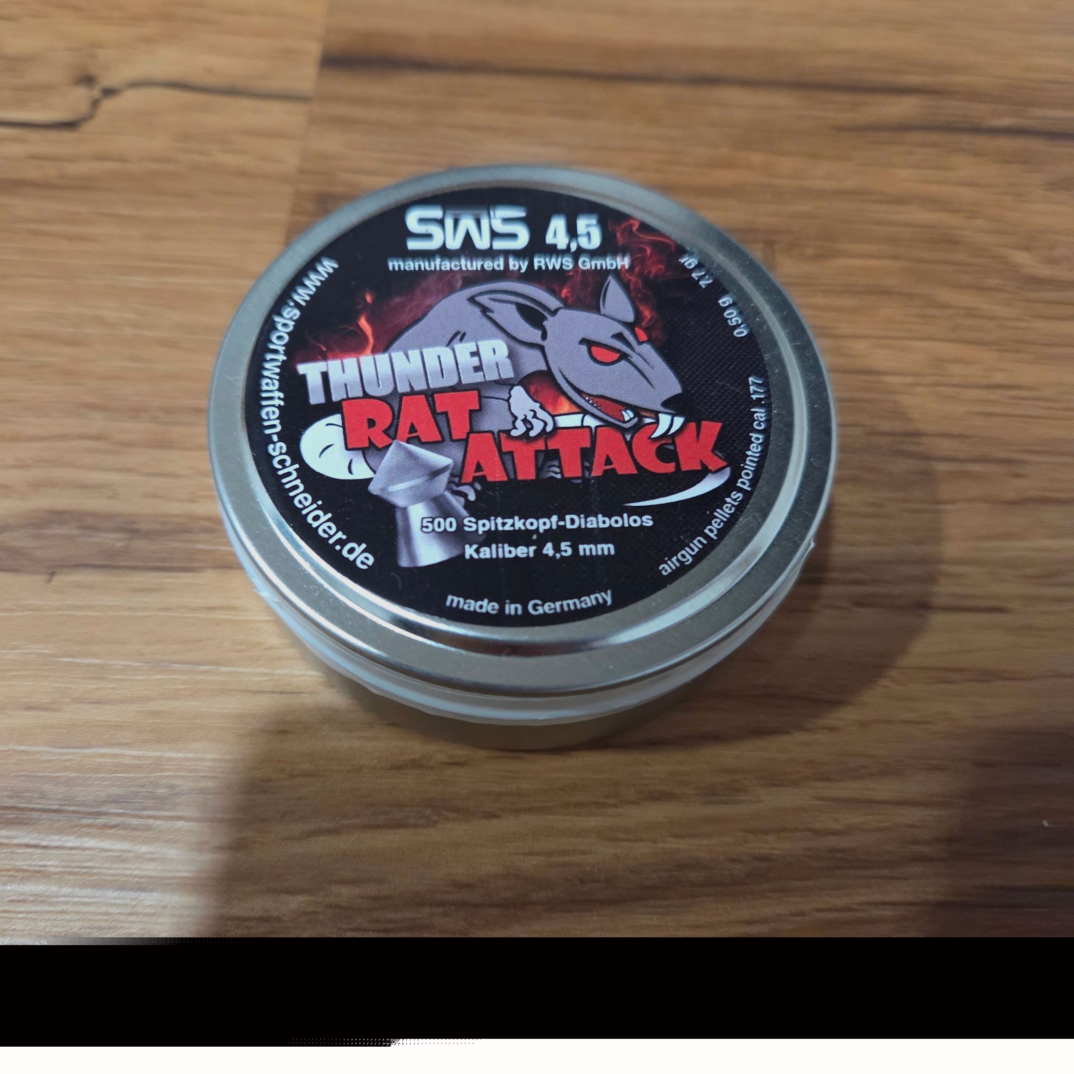 Diana Chaser with wooden handle and a pack of diabolos