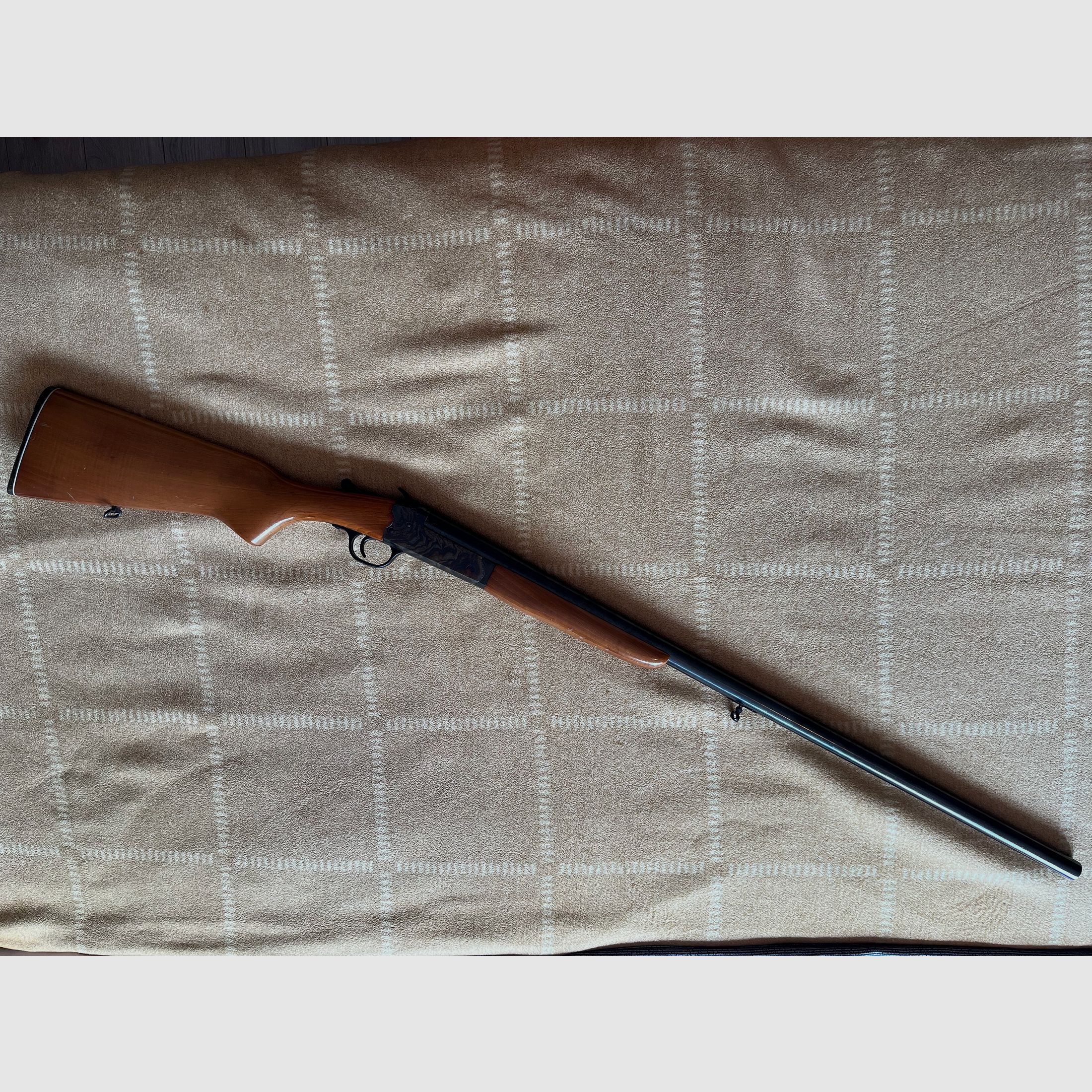 Break-action shotgun 12/70 with ejector