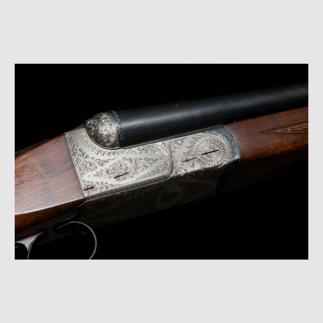 elegante Doppelflinte mit umfassender Gravur