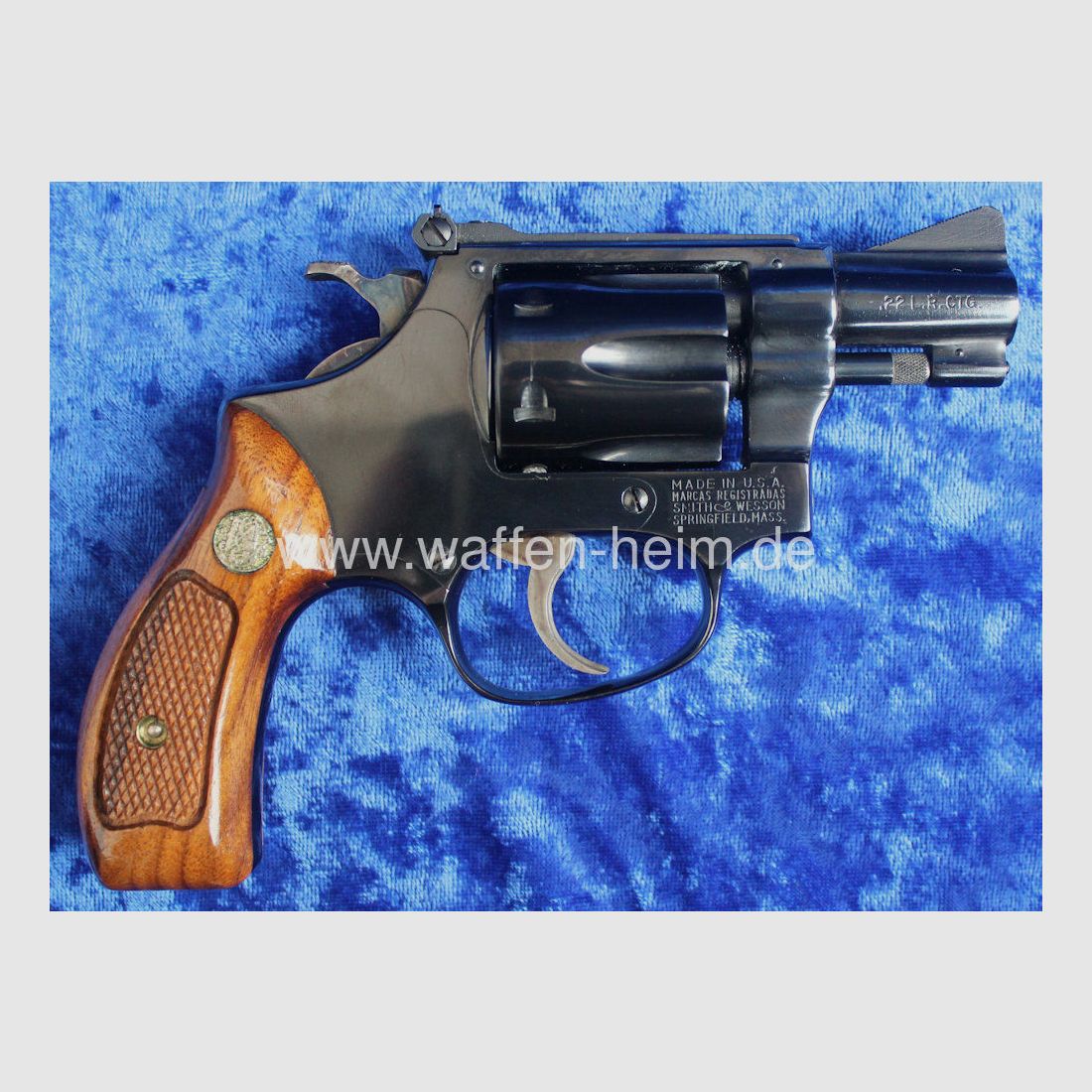 Smith & Wesson	 34 - 1 / 2"