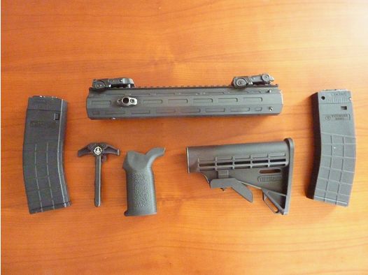 Tippmann Arms M4-22 handguard 12", charging handle and two 25 round magazines