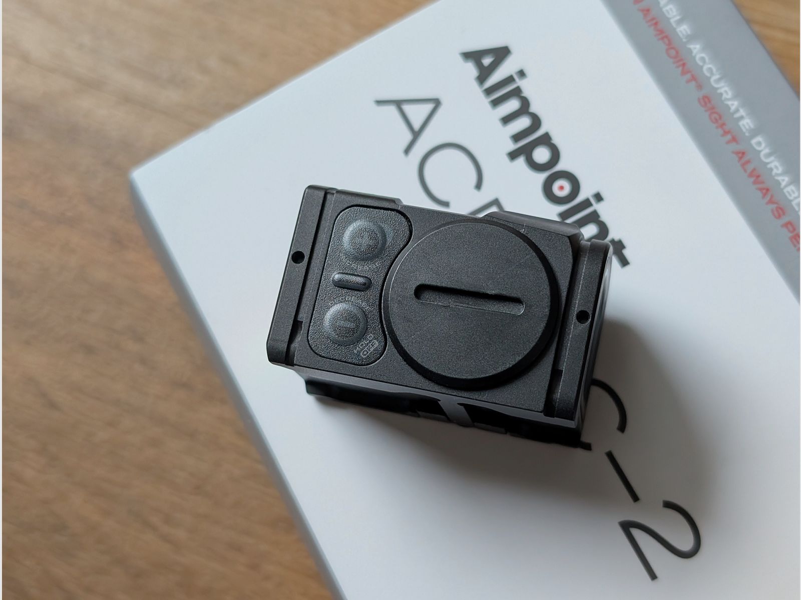 Two months old Aimpoint ACRO C-2 with receipt