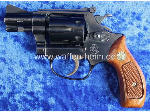 Smith & Wesson	 34 - 1 / 2"