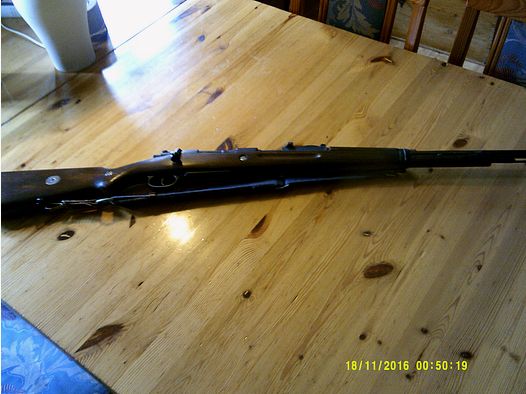 Double Bell Karabiner K 98 calibre 6mm BB con culata de madera y plástico.