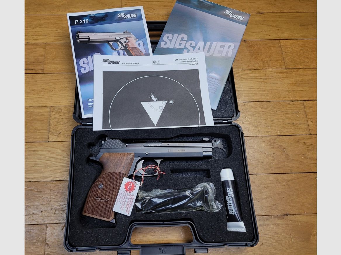 Somptueux Pistolet Sig Sauer P210 Legend Target 5 pouces – Cal. 9×19 – Modèle spécial issu du Mastershop Sig Sauer – Détente simple action / Top départ – Puits de chargeur élargi – 2 chargeurs 8 coups – Sûreté ambidextre – Bronzage Azote – Coffret d&rsquo;origine complet – Arme à l&rsquo;état de neuf au prix de l&rsquo;occasion!, image 25 sur 25