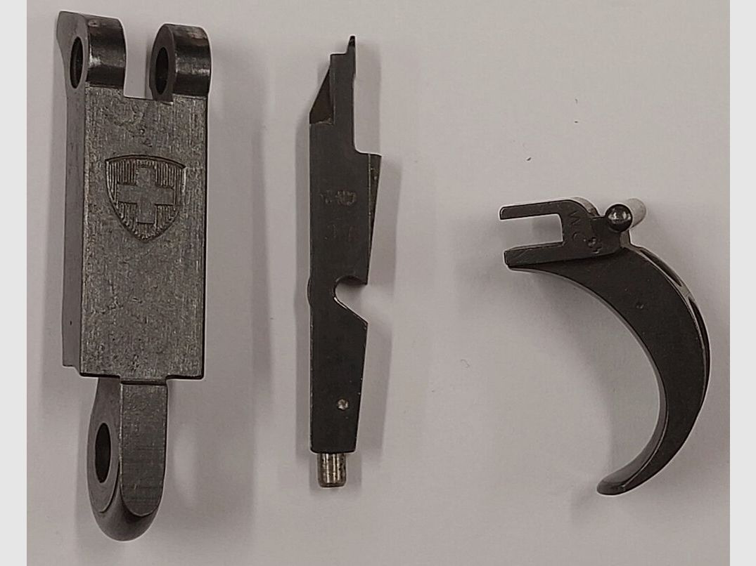 Waffenfabrik Bern Konvolut verschiedene Teile für Schweizer Ordonnanzpistole Parabellum im Kaliber 7,65mmPara W+F, P08