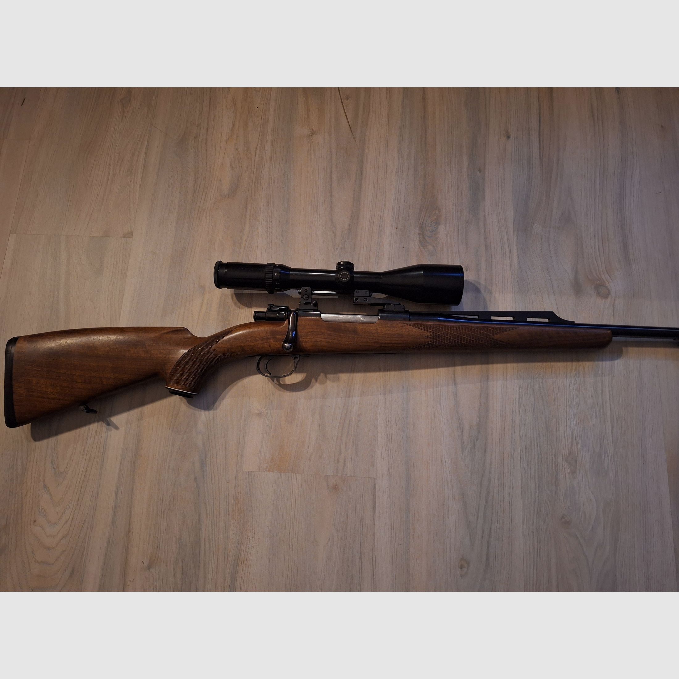 Repeater rifle based on Mauser 98 including scope 3-12x50