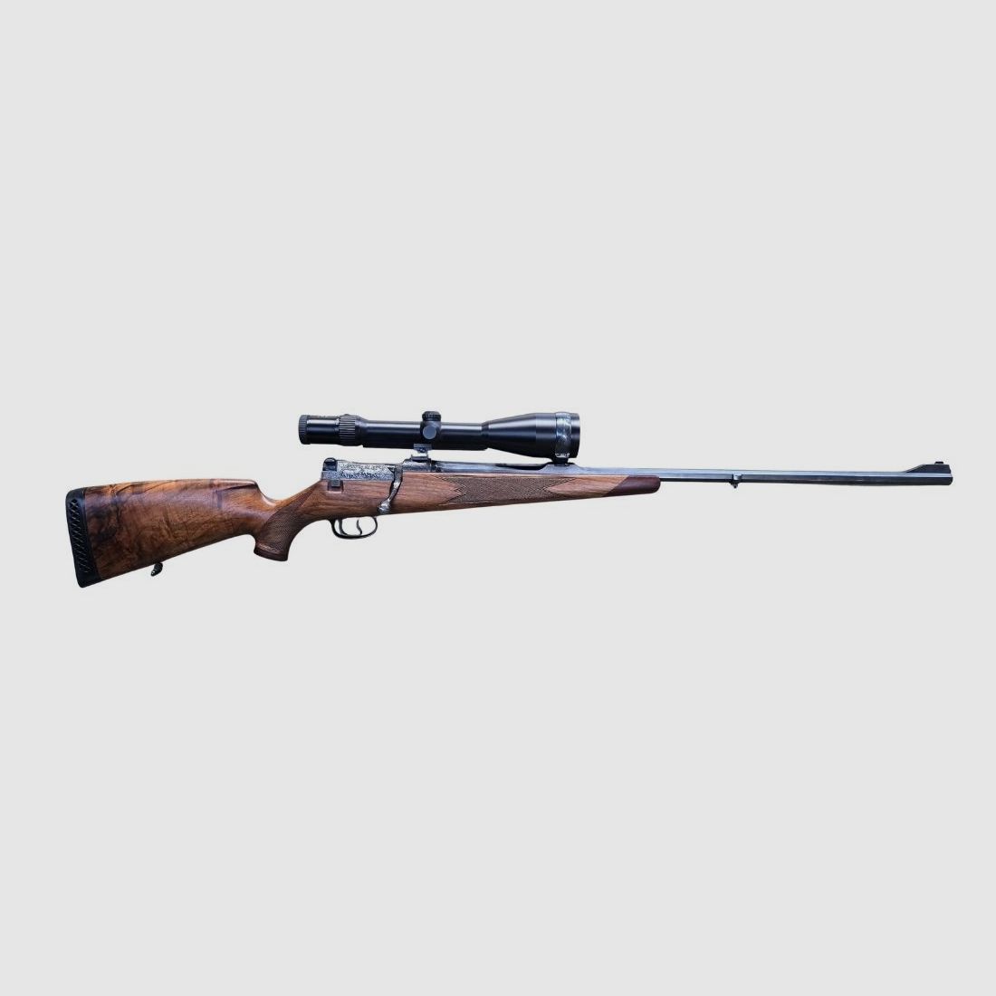 used MAUSER 66 Luxury with engraved system and mount, octagonal barrel, with SEM mounted DOCTER 3-9x56L dot sight with 3 bars, condition: Very good, image 1 of 8