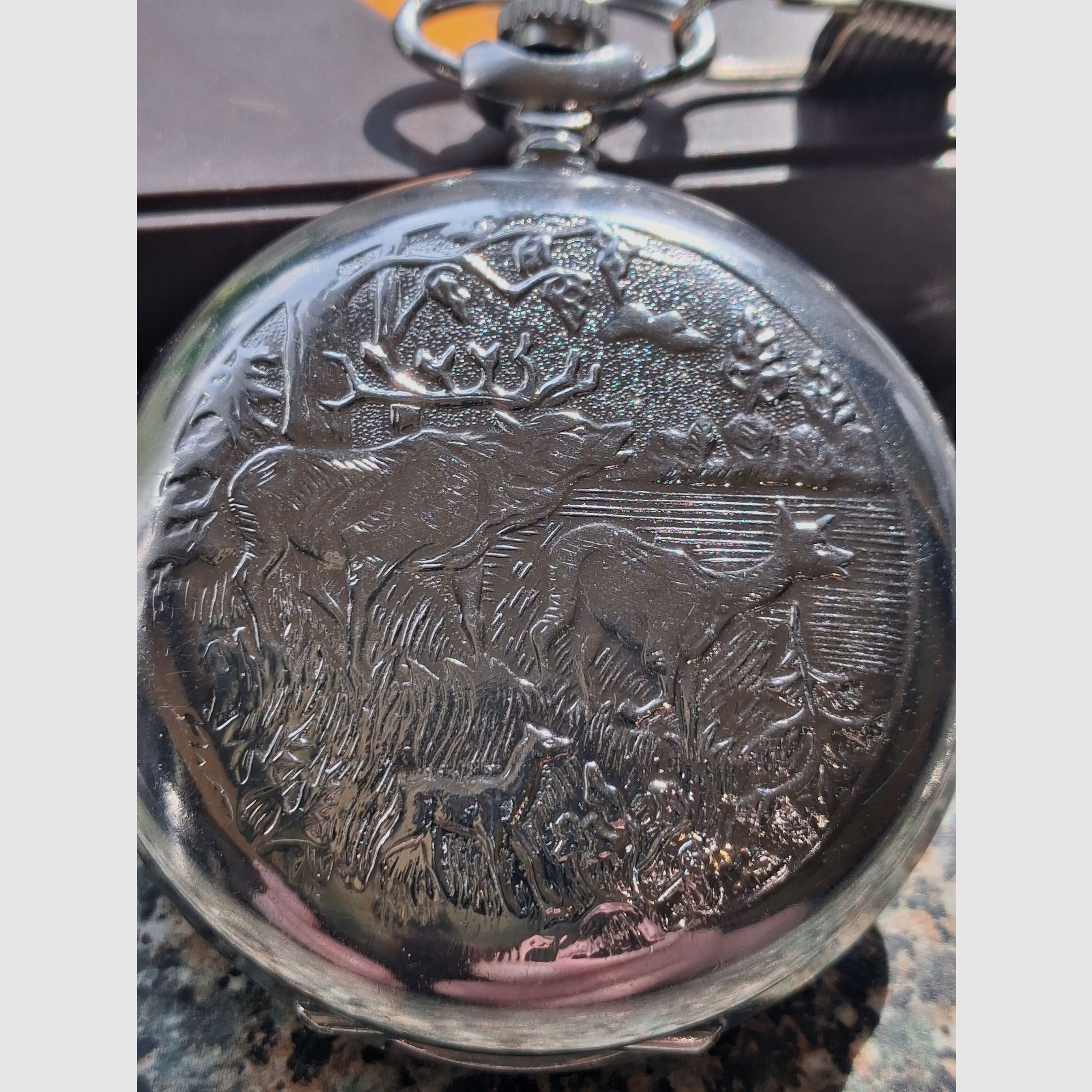 Zakhorloge met jachtthema