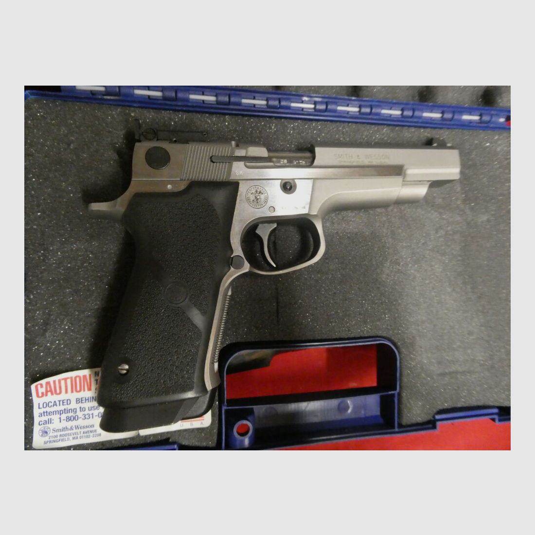 Smith & Wesson	 9 mm Target Champion , Performance Center