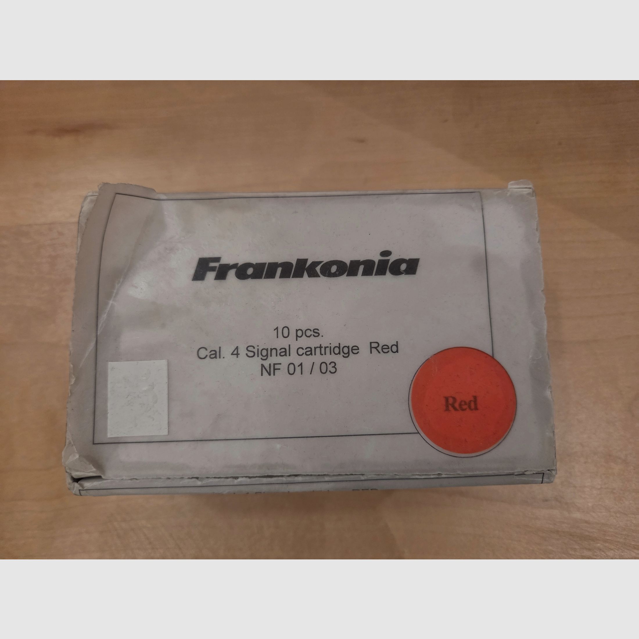 Flare gun with red signal ammunition