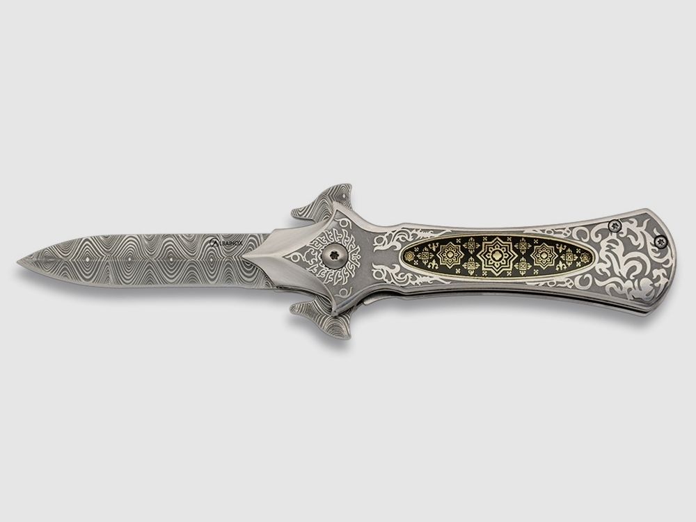 Couteau pliant orné d'un côté, lame en damas style affûtée.