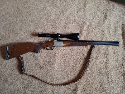 Escopeta combinada de Blaser, modelo BBF 700/88, calibre 12/70 cañón de escopeta, .30-06 cañón de rifle, visor Schmidt & Bender 2,5 - 10x