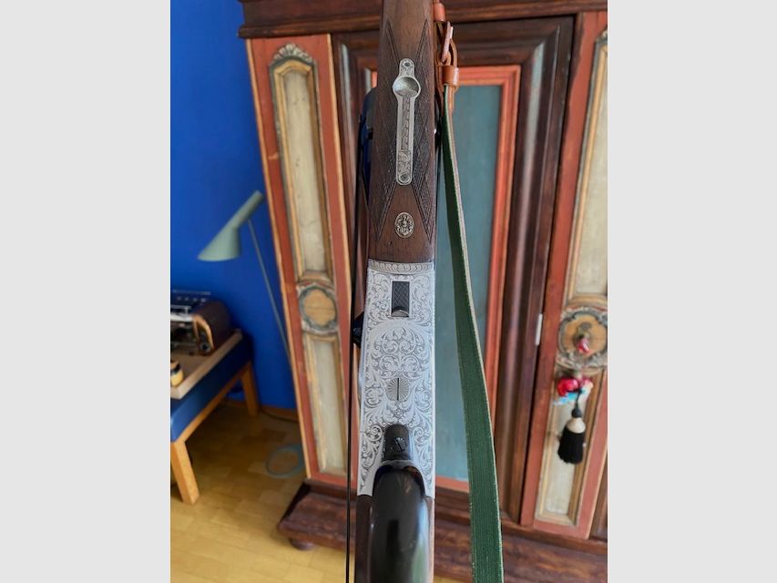 Krieghoff Ulm Modelo Ulm Cerrojo lateral Holland & Holland escopeta de doble cañón con cañón intercambiable 6,5x57R 20/76 Magnum 16/70 16/70 en maletín en excelente estado BBF BDF