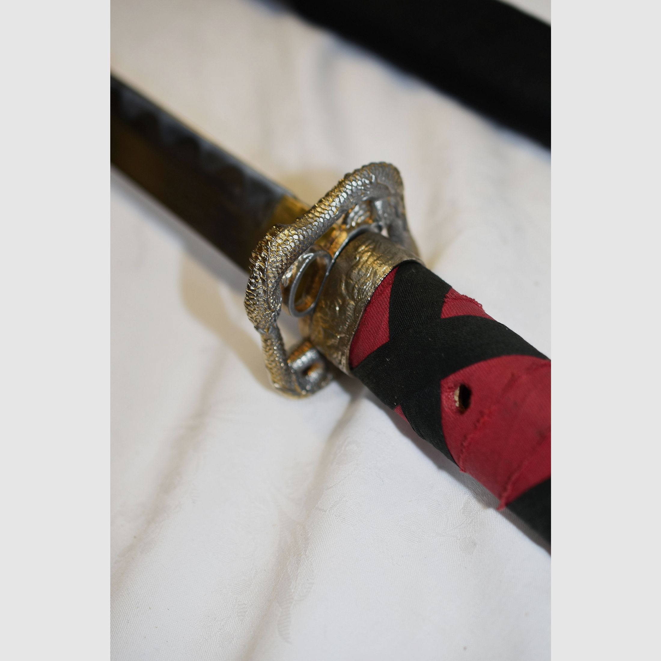 Japans zwaard, Samurai, Katana, Wakizashi, met Menuki op de greep