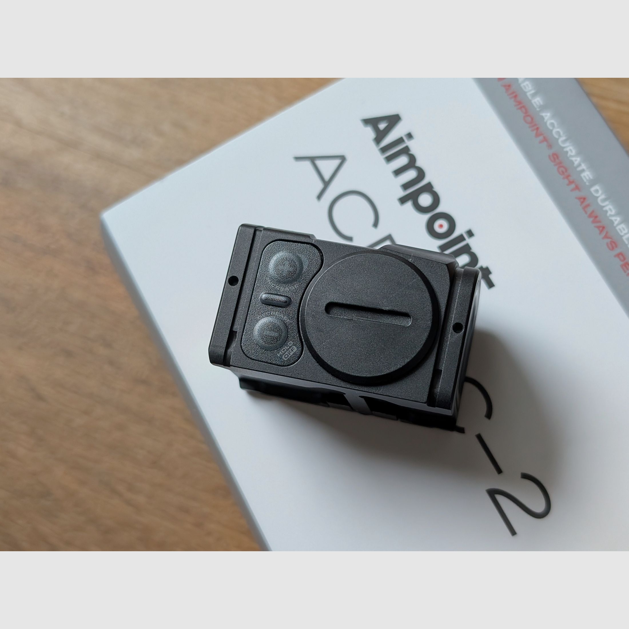 Two months old Aimpoint ACRO C-2 with receipt