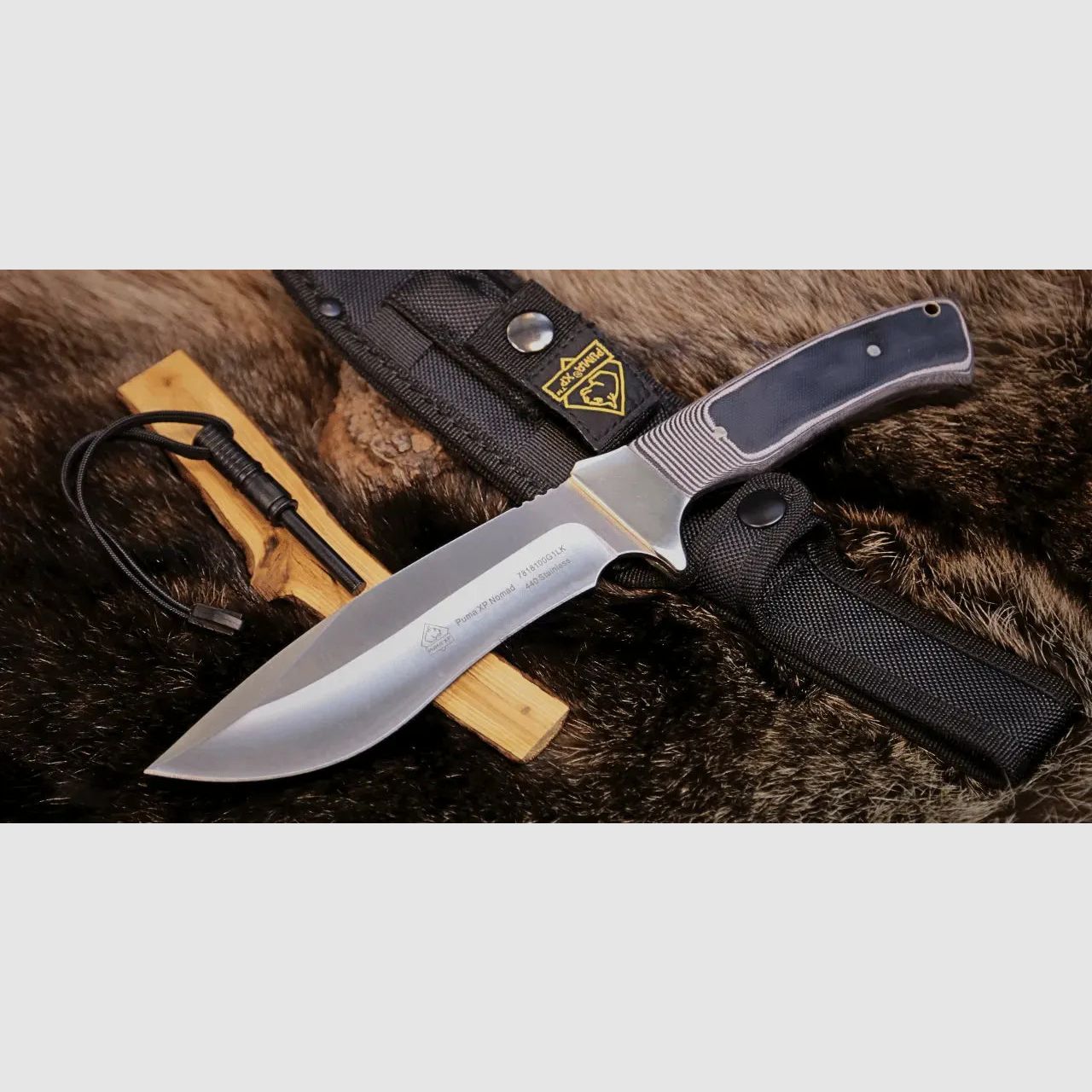PUMA XP nomad met vuurstarter, G10 zwart