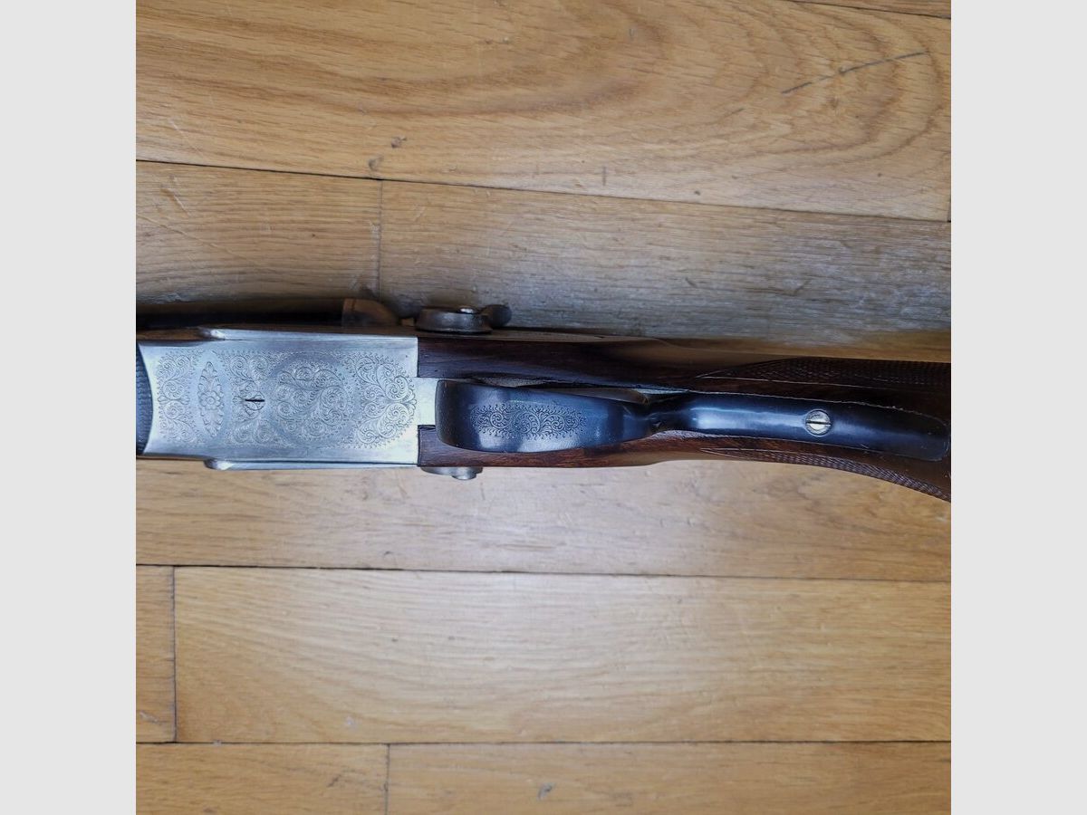 Bellissimo fucile sovrapposto con cane esterno – In 12/70 – Di Victor Sarasqueta sotto il marchio Ego – Vere piastre percussive (!) – Alto livello di finitura – Calcio a pistola con guancia viennese in noce oliato senza il minimo segno – Grande riserva alla chiave – Canne a specchio con perfetta brunitura – Prova 1200 bar -Come nuovo, immagine 12 di 38