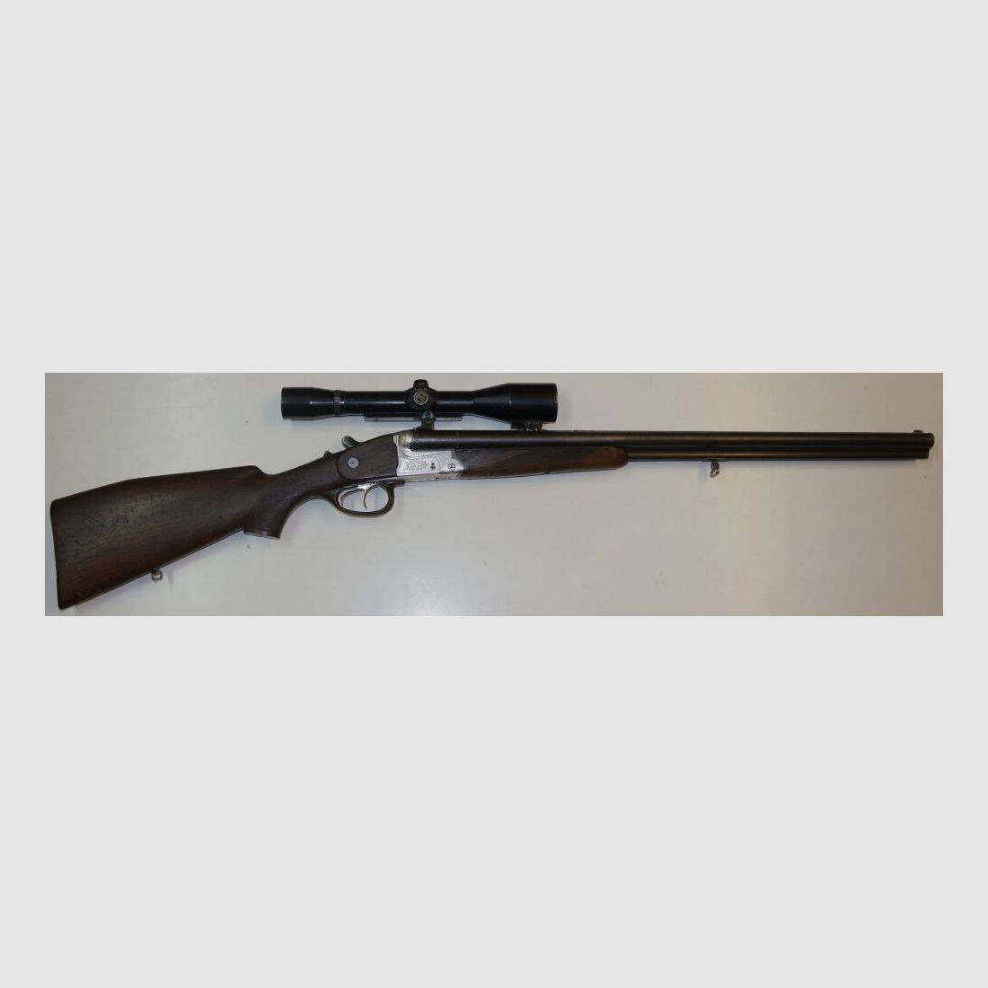 Krieghoff Drilling, Krieghoff, Kal.7x57R / Kal.16/70, mit GECO Zielfernrohr und schönen Gravuren
