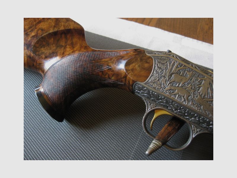 WORLDWIDE GUARANTEED UNIQUE LOVERS' WEAPON = Almost new "Custom STEEL SYSTEM completion" with HAND ENGRAVINGS for R93, with right-handed semi-weight custom stock and category-11 !! The system is still one WITHOUT serial number !! Including Blaser leather rifle sling!